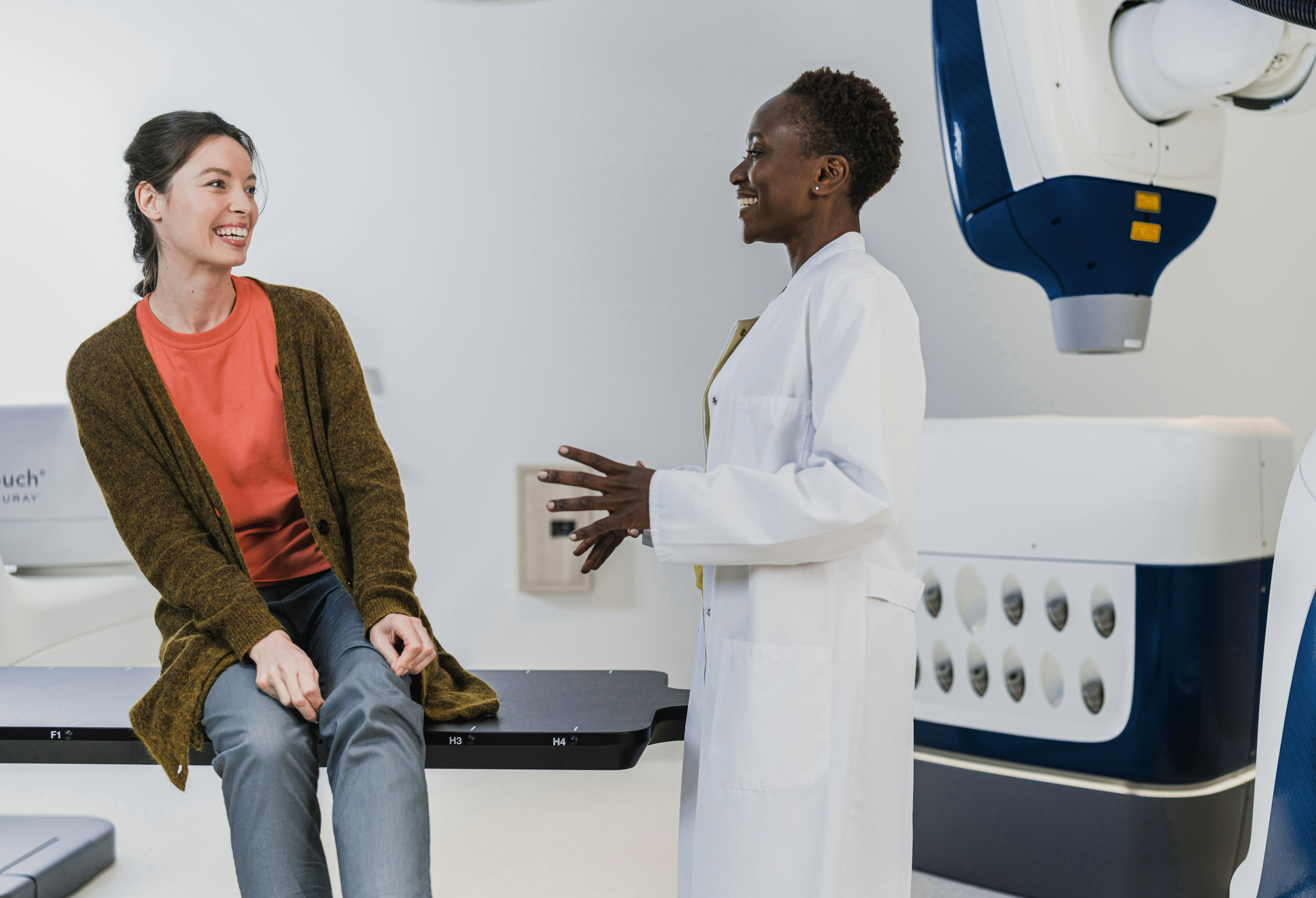 Doctor assisting a woman with healthcare-related issues.