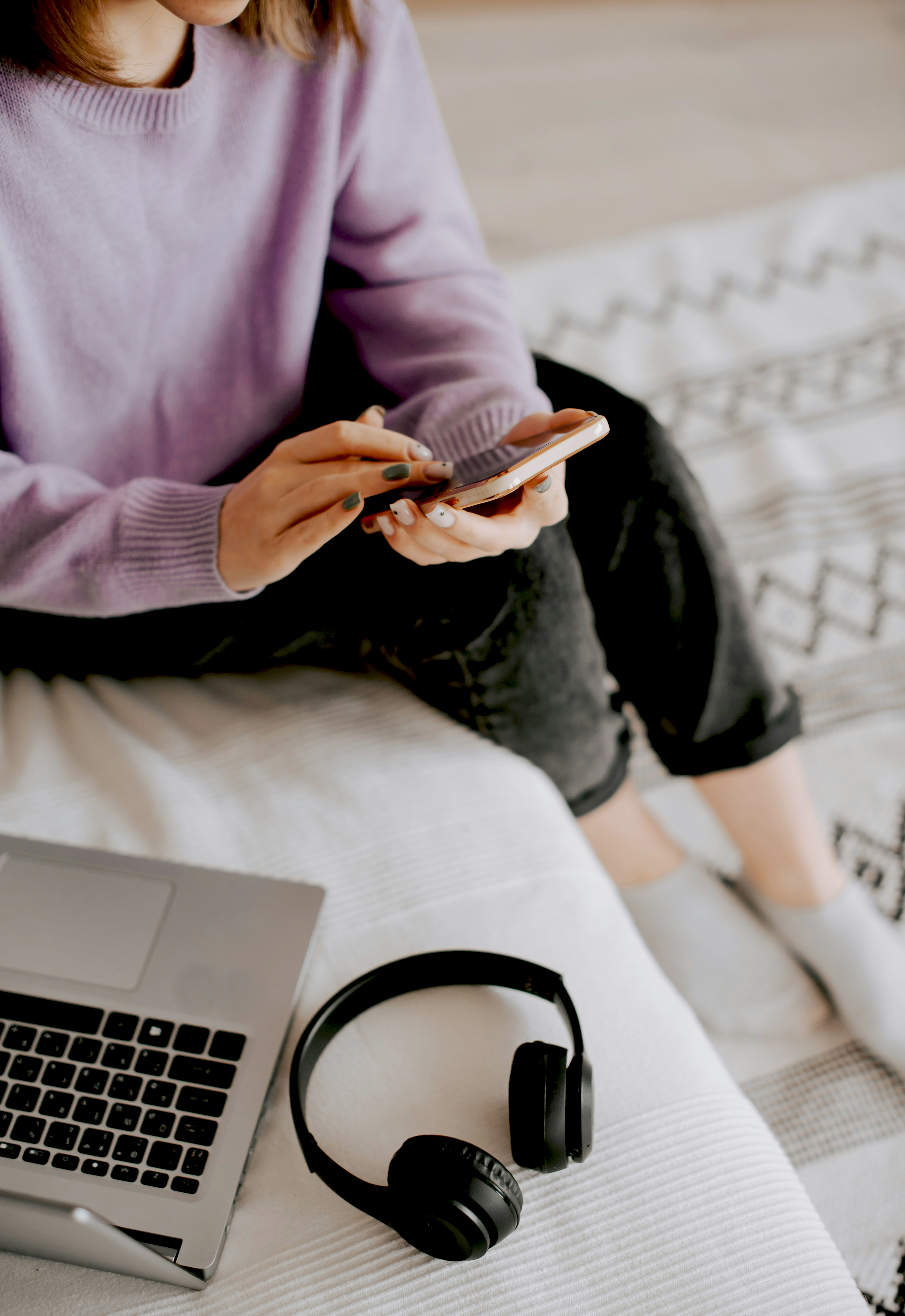 Person using a smartphone to tip a music artist directly through a streaming app without leaving it.