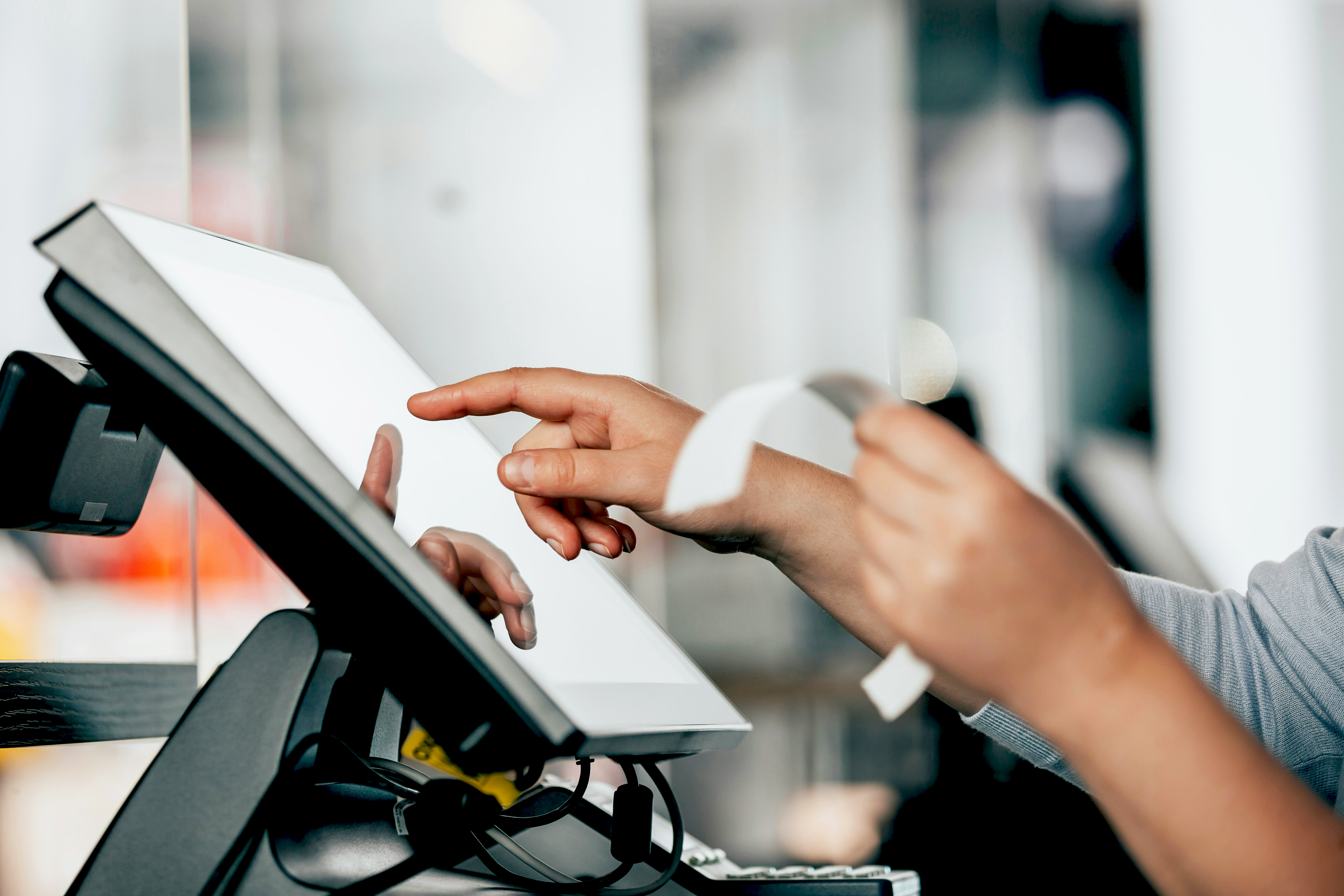 Someone holding a receipt.